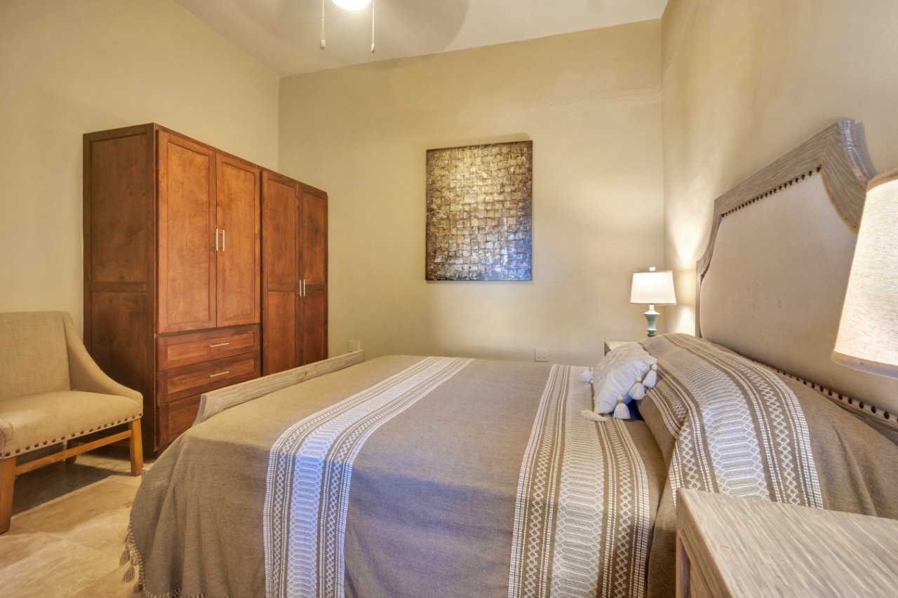 Bedroom with custom cabinetry