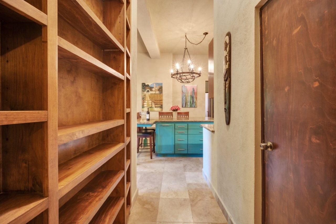 Storage leading toward the kitchen