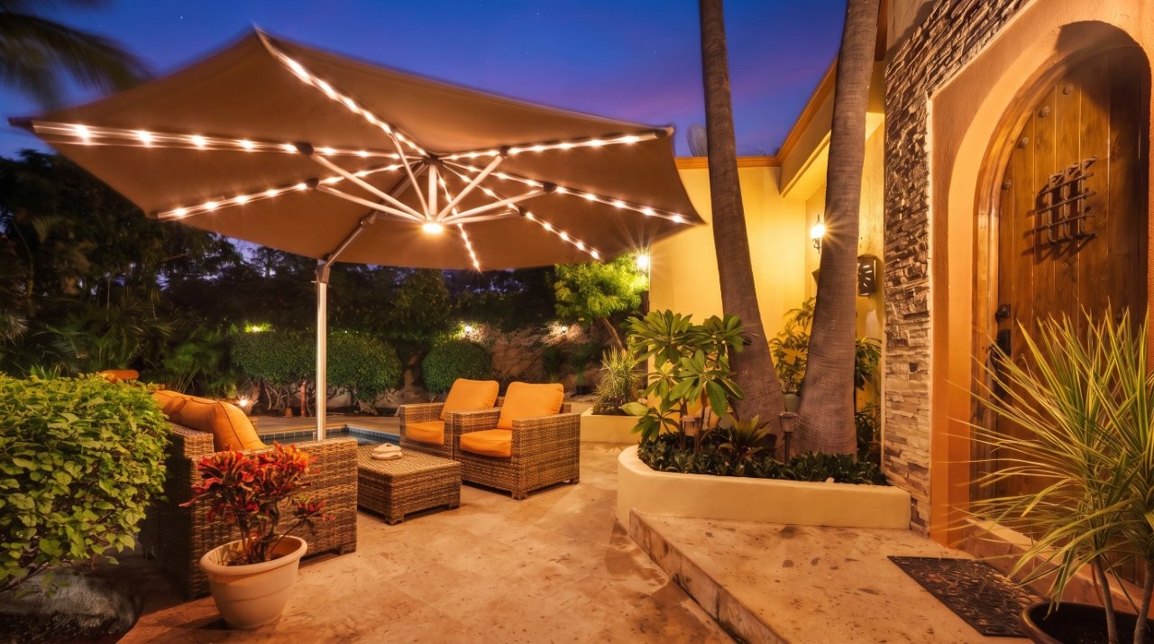 Outdoor seating and landscape lighting at night